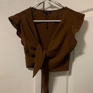 Brown blouse. Light fresh material. Never worn.
